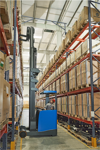 An image of a forklift organizing the shelves
